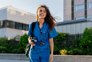 preparing for travel nursing, nurse wearing scrubs outside